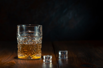 Whiskey in glass with ice