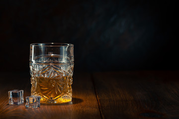 Whiskey in glass with ice