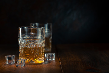 Whiskey in glass with ice
