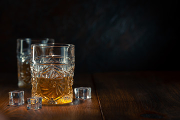 Whiskey in glass with ice