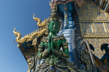Fototapeta na wymiar Wat Rong Suea Ten, the famous blue temple in Chiang Rai