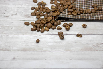 coffee bean on rustic table with a blank space for a text, coffee bean on white background