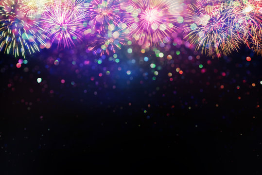 beautiful fireworks and glitter bokeh lighting effect Colorfull Blurred abstract background for anniversary, new year eve or Christmas