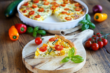 Quiche with tomatoes, spinach and feta cheese