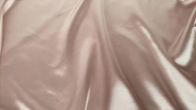 beautiful silk fabric of a delicate cream color draped with small folds, soft flowing, luxurious, wedding concept, texture, background, card form, copy space
