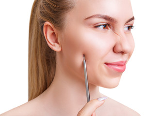 Mechanical cleaning of young female face with acne loop