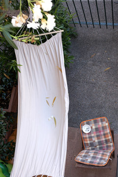 relax concept: white hammock and a chair view from above with copy space for your text