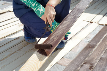 man sawing wood