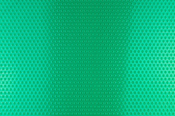 Real texture made of green rubber rhombus close up, illuminated with light.