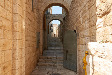 Fototapeta na wymiar historical small street at old city, Jerusalem