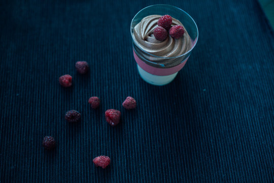 Sweet chocolate tiramisu at the black table