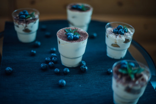 Sweet tiramisu cake at the table