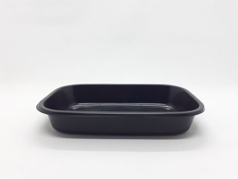 Empty Black Dark Plastic Food Container For Kitchen Utensils In White Isolated Background