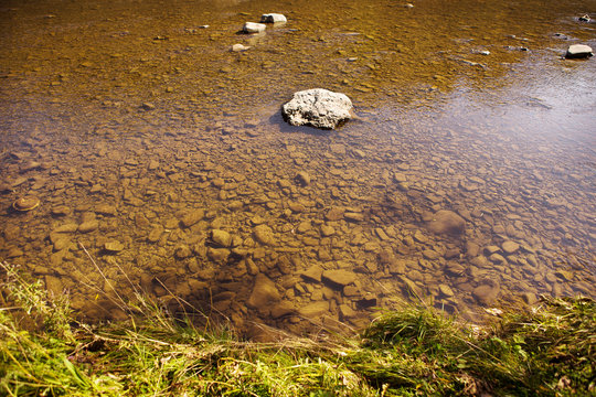 the river in the Carpathians, all in the rocks is clean and very clear water, the top view