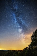 Fototapeta na wymiar The milkyway with some light pollution, captured in a warm summernight, in Saarland, Germany.