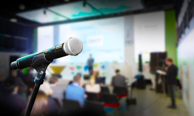 Microphone in conference room blurred concept