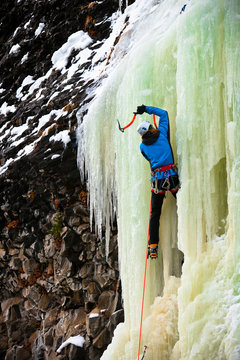 Marko Pujic climbs The Good Looking One in M5 WI5 conditions in Hyalite Canyon in Montana.