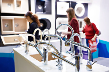 Customers at a store of kitchen appliances