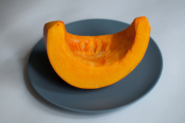 slice of pumpkin isolated on white