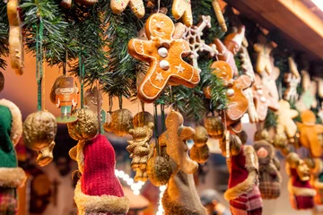 Deurstickers Christmas decorations at Christmas market stall in Berlin Germany © Dmitry Naumov