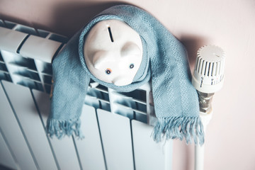 piggy bank with scarf on Heating System