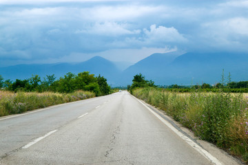 Scenic road into the storm clouds in Olympus mountains, Greece