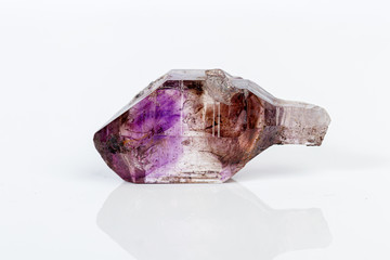 macro mineral stone Amethyst on smoky quartz on a white background