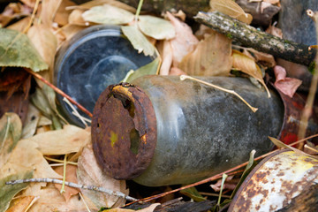 Old, weathered, rusted food jar