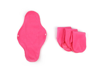 Reusable sanitary napkin pads on white background