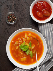 Tomato fish soup with celery. Mediterranean soup. Tunisian soup.