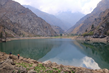 Picturesque Urungach lake in mountains on early autumn in Uzbekistan