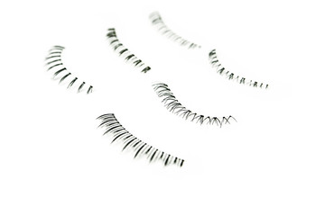 fake false eye lashes on white background 