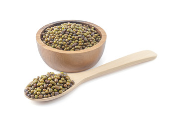 Mung beans in wooden bowl and wooden spoon isolated on white background with clipping path