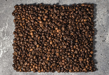 coffee beans on burlap background with copy space for text