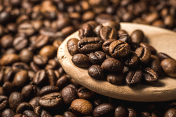 aroma brasil coffee beans on wooden background