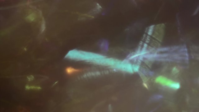 Mixed-colored psychedelic geometrical cyberpunk iridescent background. ProRes 4k. Use it or any kind of project.