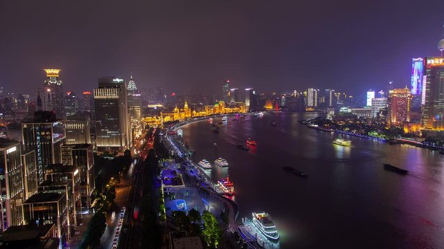 Shanghai huangpu river urban cityscape aerial skyline panorama timelapse at night zoom out