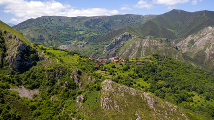 Fototapeta na wymiar aerial view of mountains and village