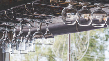 Upside Down Wine Glasses over the bar