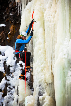 Marko Pujic climbs The Good Looking One in M5 WI5 conditions in Hyalite Canyon in Montana.