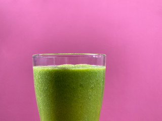 Healthy green smoothie in glass