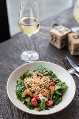 Warm Chanterelle and Hazelnut Salad. Glass of White Wine.