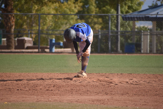 baseball player safe at second base