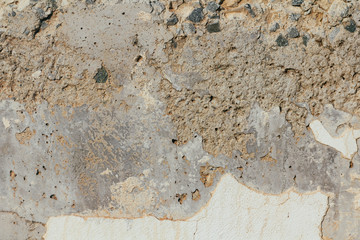 Concrete wall texture background. Natural stones. Building's facade decor. Decorative plaster. House exterior.