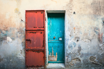 Doors blue and red, old building