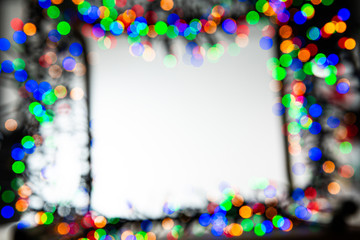 Frame made of Christmas blur colorful light on the background white color