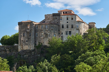 Fototapeta na wymiar Medieval castle on the rock in Largentiere in France.