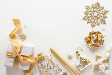 Christmas decorations in gold colors on white background