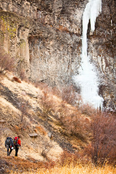 Craig Pope (left) and Beau Carrillo approach Zenith, a big, two pitch ice climb at Banks Lake in Washington.