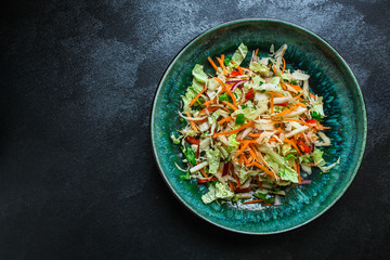 vegetable salad (Chinese cabbage, carrot, onion, lettuce, mix salad) menu concept. food background. top view. copy space